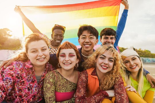A diverse and joyful group of LGBTQ+ people celebrating, representing affirmative psychotherapy for LGBTQ+ adults at Inner Growth Pathways